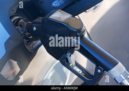 pumping gas in a car Stock Photo