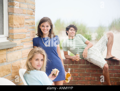 Friends drinking beer outdoors Stock Photo