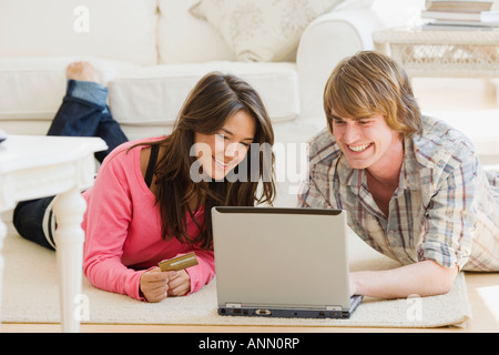 Couple looking at laptop Stock Photo