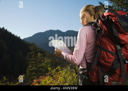 Female hiker looking at map, Utah, United States Stock Photo