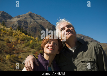 Senior couple hugging outdoors, Utah, United States Stock Photo