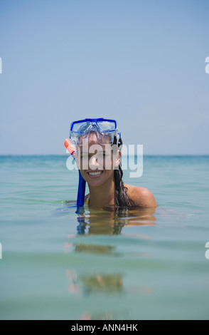 Woman wearing snorkeling gear in water, Florida, United States Stock Photo