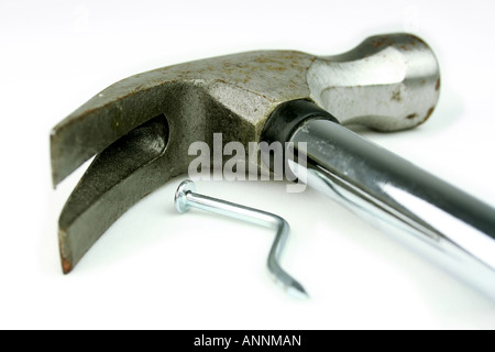 bent nail and hammer Stock Photo