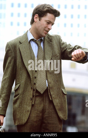 Business executive checking the time diary. Tony Rusecki Stock Photo