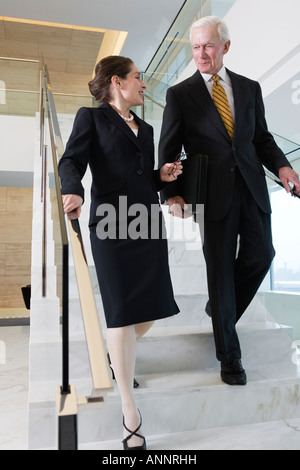 View of businesspeople discussing in an office. Stock Photo