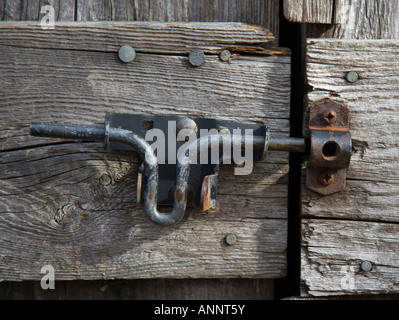 Latch on an old wooden door Stock Photo