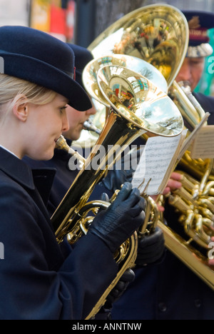 Girl playing euphonium in brass band - Stock Illustration