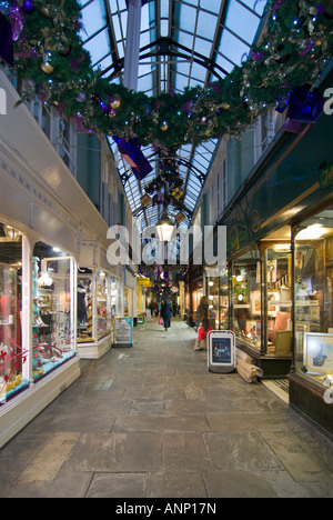Horizontal wide angle of Morgan arcade the oldest Victorian arcade in central Cardiff decorated at Christmas