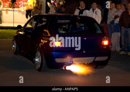 Tuning by night with flames competition from the muffler - Boario tuning show 2006 - Italy Stock Photo