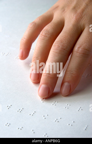 Hand reading braille Stock Photo