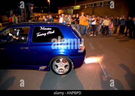 Tuning by night with flames from the muffler - Boario tuning show 2006 - Italy Stock Photo