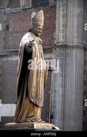 Statue made from melted brass keys of Pope John Paul II in front of the old Basilica of Guadalupe in Mexico City Mexico Stock Photo