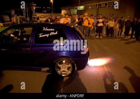Tuning by night with flames from the muffler - Boario tuning show 2006 - Italy Stock Photo
