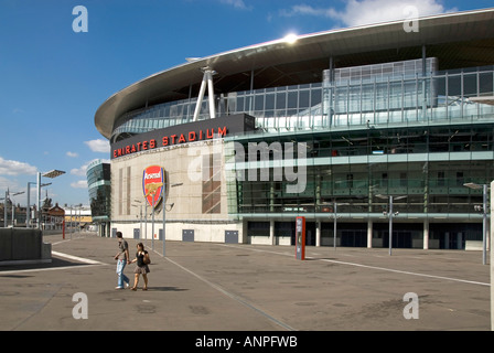 Arsenal Gunners football club team badge & business logo shield & sign on wall of Emirates sports stadium modern building Holloway London England UK Stock Photo