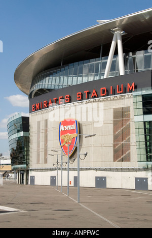 Arsenal Gunners football club team badge & business logo shield & sign on wall of Emirates sports stadium modern building Holloway London England UK Stock Photo