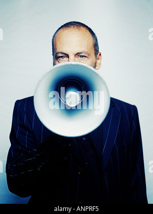 Man using a megaphone Stock Photo