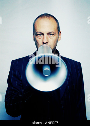 Man using a megaphone Stock Photo