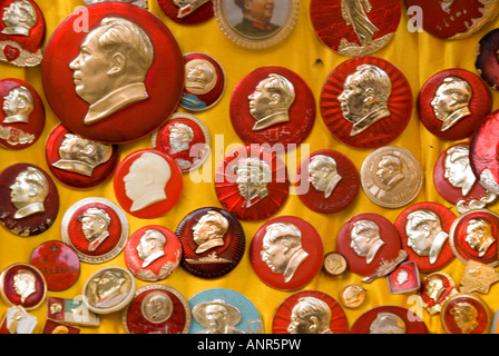 cultural revolution era badges for sale in Dongtai antiques Market, Shanghai, China Stock Photo