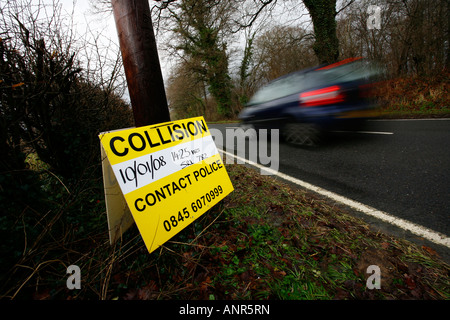 Police sign at the scene of a fatal road accident. Picture by James Boardman Stock Photo