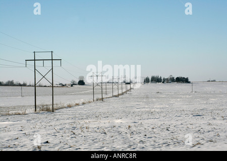 Rural electric power transmission lines in winter Stock Photo