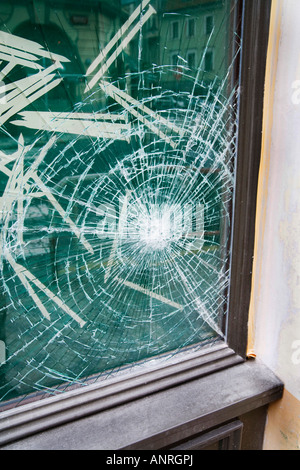 Broken plate glass window in shop Prague Czech Republic Stock Photo