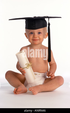 Child with graduation cap and diploma Stock Photo