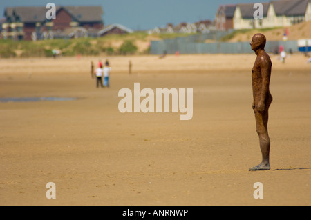 Another Place public sculpture on Crosby Beach Sefton coast UK Stock Photo