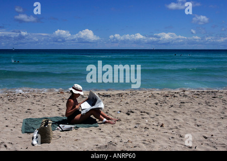 People sunbathing in Mondello beach on a hot autumn afternoon Stock