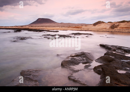 Montaña Amarilla on La Graciosa island in the Canary islands at sunrise. Stock Photo