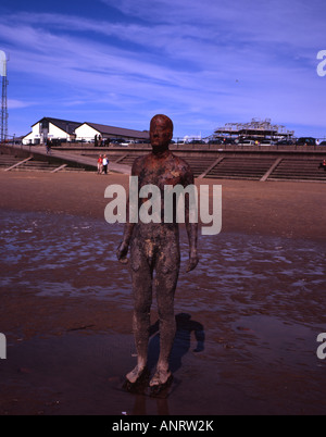 Anthony Gormley Another Place a series of figure sculptures on the beach at Crosby near Liverpool Merseyside England Stock Photo