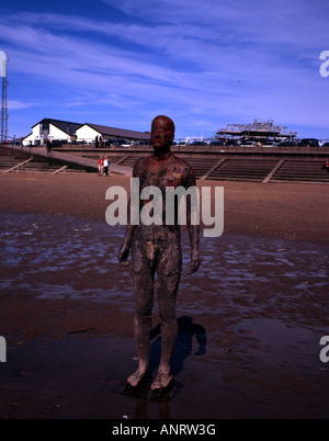 Anthony Gormley Another Place a series of figure sculptures on the beach at Crosby near Liverpool Merseyside England Stock Photo