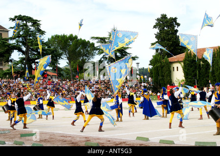 Flag throwing and tossing at the historic and traditional annual Quintana ,medieval Parade in Ascoli Piceno Le Marche Italy Stock Photo