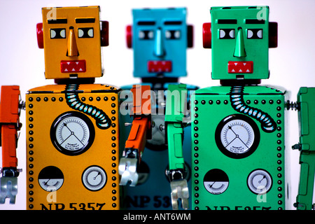3 Chinese manufactured tinplate clockwork toy robots Stock Photo