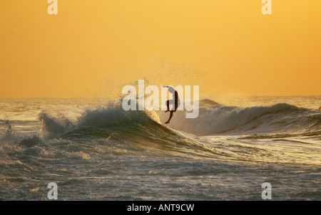 Surfer falling off Stock Photo - Alamy