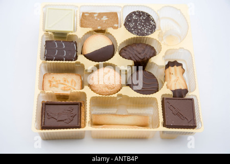 Studio Still Life A partially eaten selection box of biscuits Stock Photo