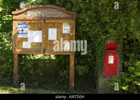 Village notice board and post box - Stopham, West Sussex. Stock Photo