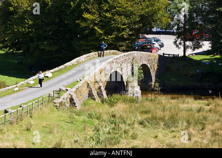 The old bridge at Two Bridges near Princetown on Dartmoor in Devon
