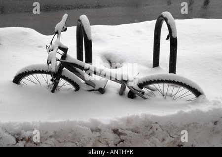 A plowed in bicycle on a cold Boston winter day. Stock Photo