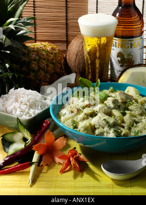 Green Thai curry rice and Thai beer gourmet editorial food Stock Photo