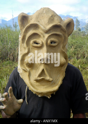 man with clay maskt at the Highland festival, Papua New Guinea Stock Photo