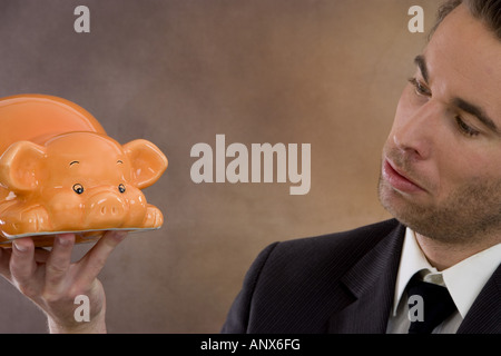 business man with piggy bank Stock Photo