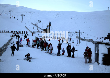 Males and females queuing for tow, Glenshee, Cairngorms National Park, Perthshire and Aberdeenshire, Scotland, UK, Europe Stock Photo