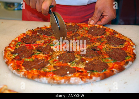 Cutting pizza La Boqueria Market Barcelona Recipe available Stock Photo