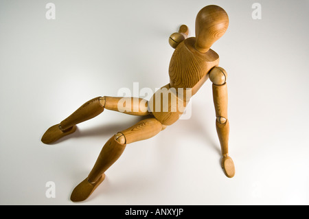 Seated Wooden Mannequin. Stock Photo