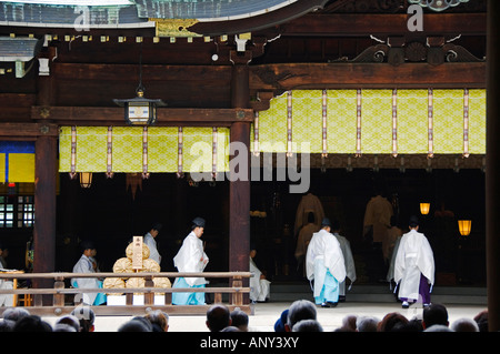 Japan, Honshu Island,Tokyo, Harajuku District. Meiji Shrine - dedicated to Emperor Meiji in 1920 - procession of Temple Priest. Stock Photo