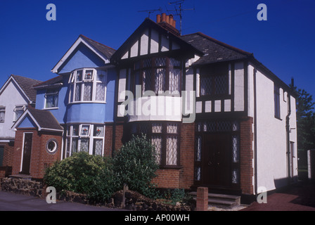 1930's semi - detached houses, Chelmsford, Essex, UK. One modernised one not Stock Photo