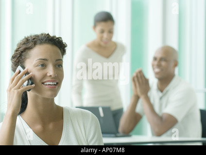 Woman using cell phone Stock Photo