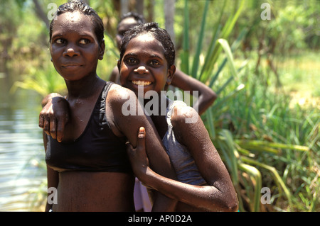 Aboriginal girls Jane leti and Tessa at Japidi Japin waterhole Arnhem Land NT Australia Stock Photo