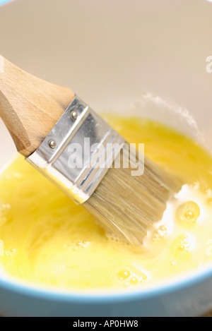 egg wash with brush Stock Photo - Alamy