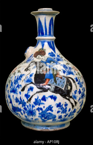 Iran water pipe pottery ceramic17 century underglazed pastime indulgence hashish opium blue horse rider cavalry stallion  under Stock Photo